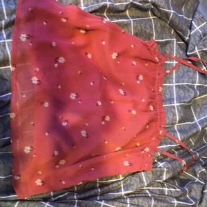 this is a cute tank, with flowers on it.